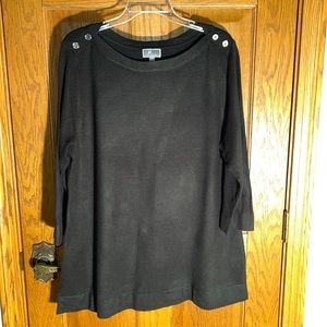 Gold tone buttons embellish shoulders